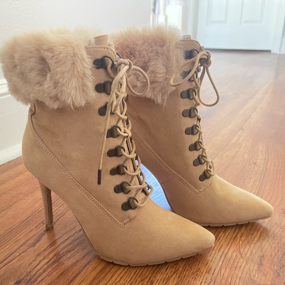 Tan suede boots with fur trim.